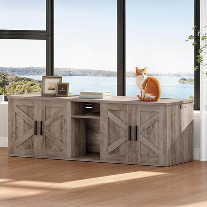 Wooden desk with barn door design in a room with large windows overlooking a scenic view.