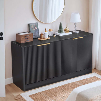 Black sideboard with decorative items in a room setting