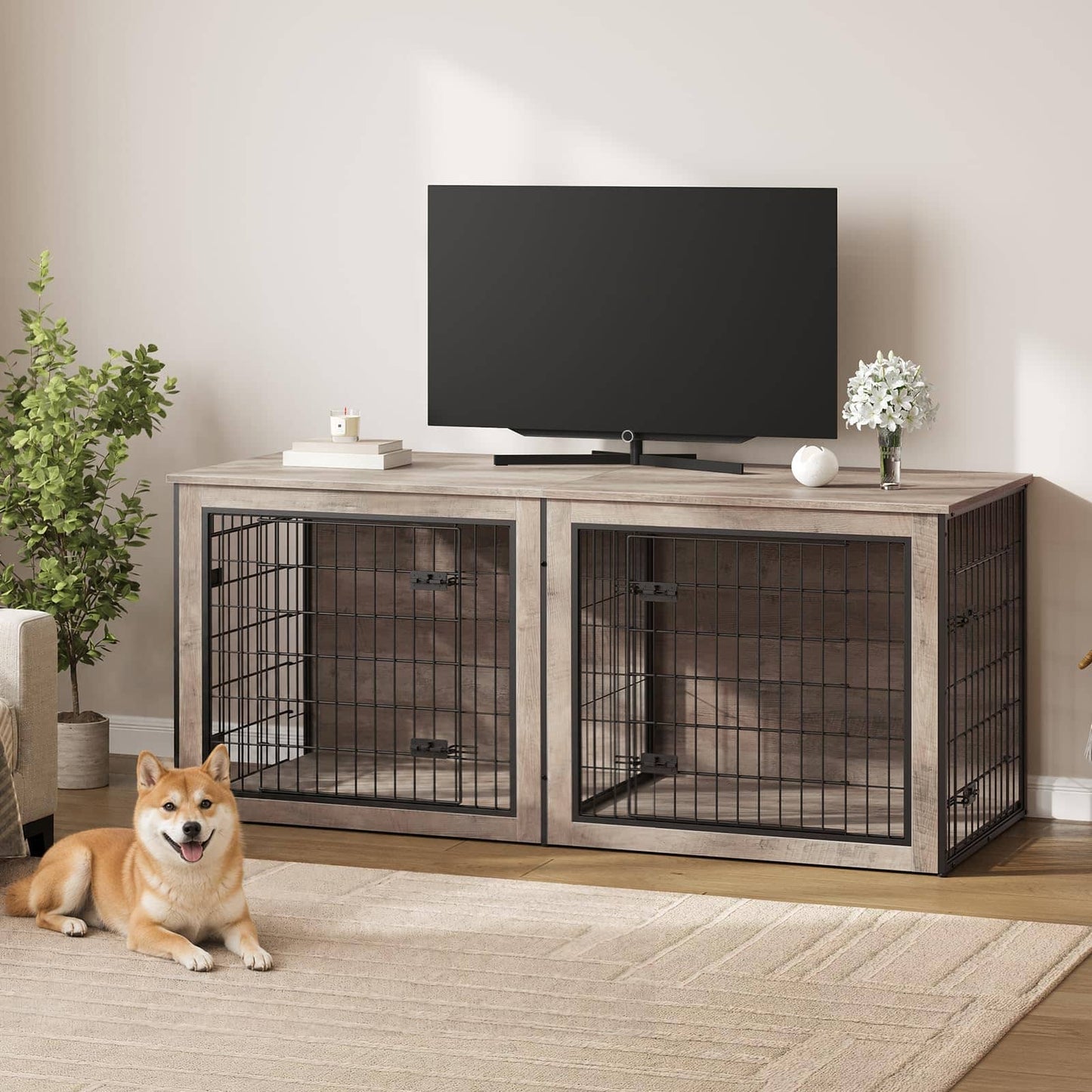 A rustic two-bay pet crate TV stand with a weathered gray-brown wood finish and black wire cribs, shown holding a flat-screen TV in a living room setting with a Shiba Inu dog lying on a beige rug in the foreground.