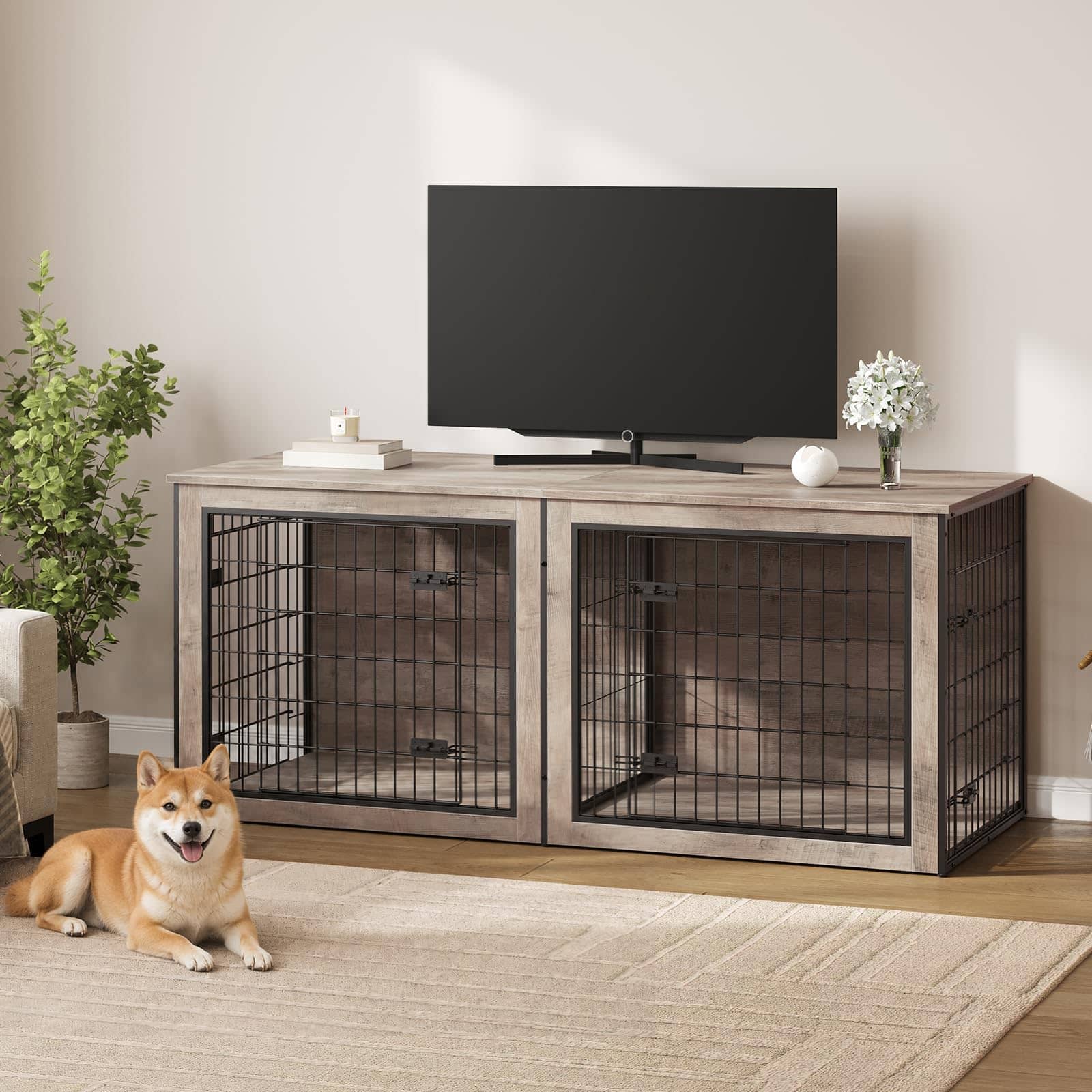 A rustic two-bay pet crate TV stand with a weathered gray-brown wood finish and black wire cribs, shown holding a flat-screen TV in a living room setting with a Shiba Inu dog lying on a beige rug in the foreground.