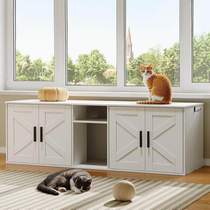 Two cats on a white entertainment console with large windows showing trees and a church spire.