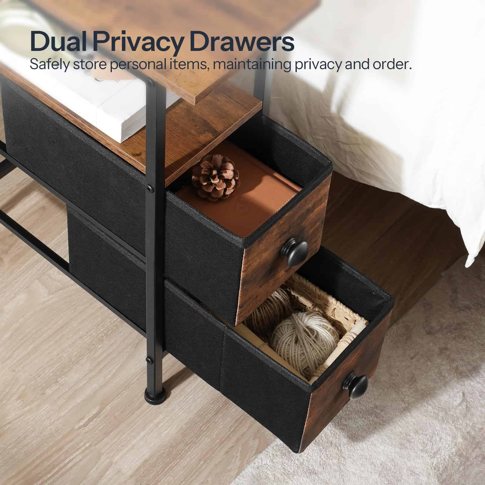 Close-up of the two collapsible black fabric drawers pulled open, demonstrating inner storage capacity for snacks, remotes, and cables.
