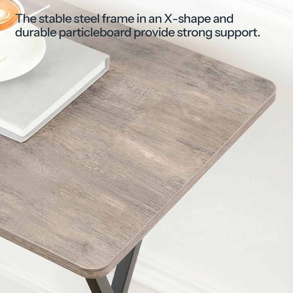 Close-up of the rustic wood grain tabletop edge highlighting the stable X-shape steel frame that provides strong support.