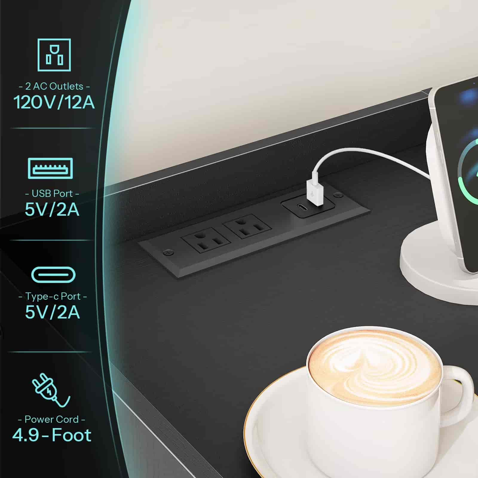 Desk setup with power outlets, USB port, and smartphone charging station, featuring a cup of coffee.