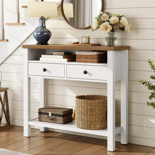 White console table with wooden top against a white paneled wall.