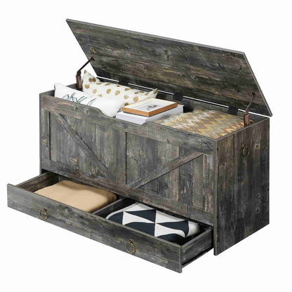 Studio shot of a rustic wooden storage trunk with the top lid open and bottom sliding drawer pulled out.