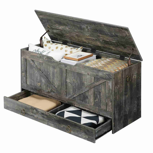 Studio shot of a rustic wooden storage trunk with the top lid open and bottom sliding drawer pulled out.