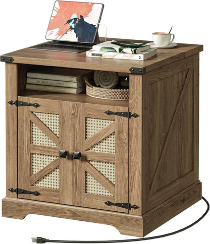 Wooden side table with a laptop, books, and a cup on top