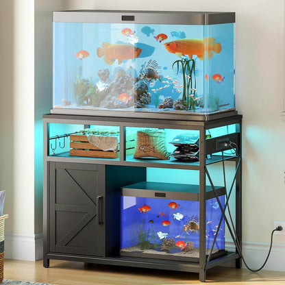 Fish tank with stand and additional tanks on a wooden floor.