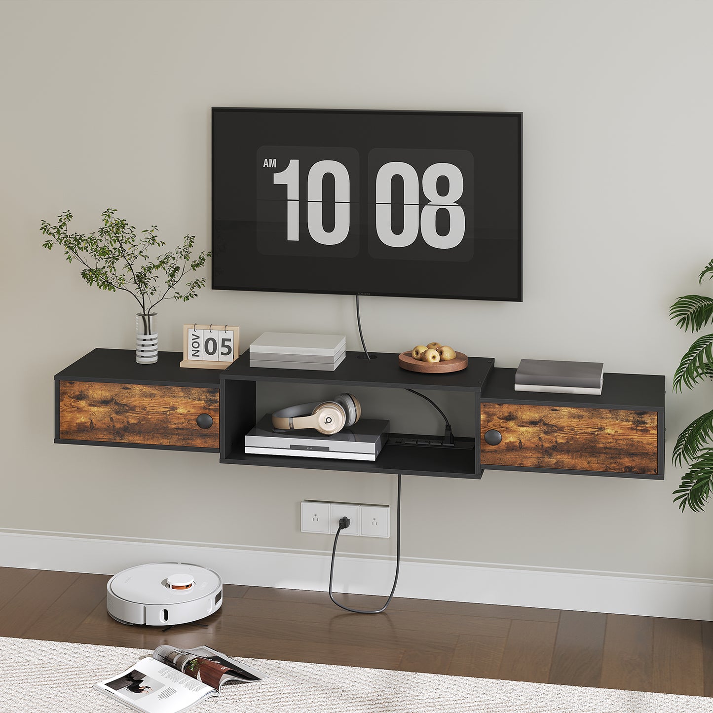Modern living room with a floating shelf, digital clock, and robot vacuum cleaner.
