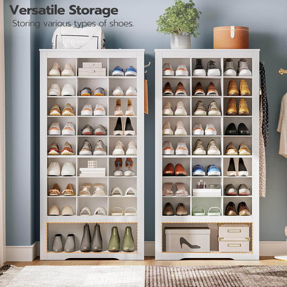 Two white freestanding shoe organizer cabinets placed side-by-side inside a walk-in closet wardrobe.