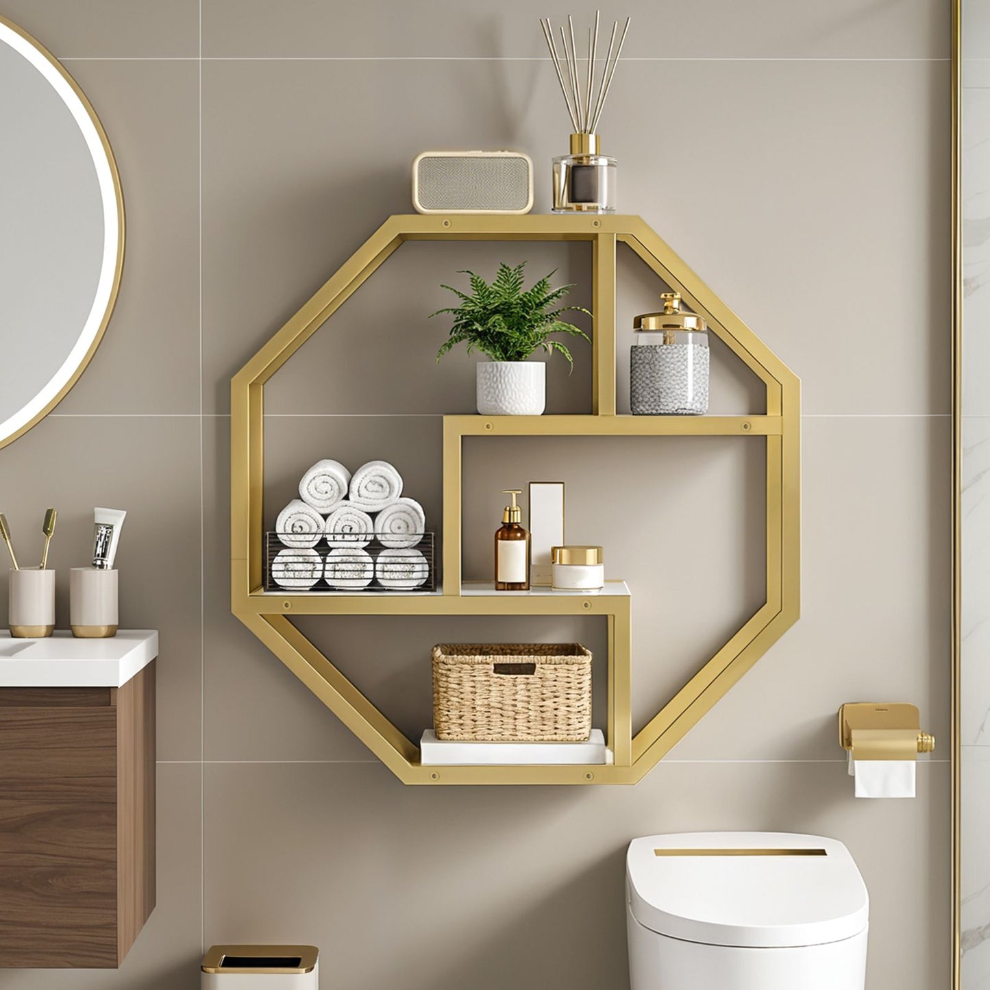 Gold and white wall shelf styled in a modern bathroom above the toilet holding rolled towels and accessories.