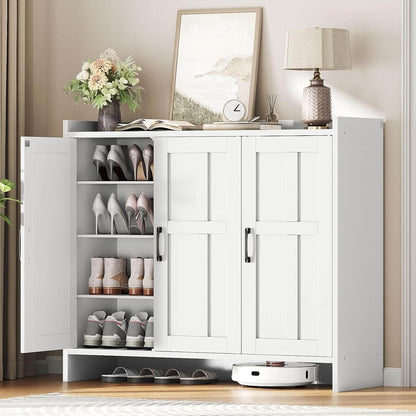 White shoe cabinet with open doors displaying shoes and decor items in a room.