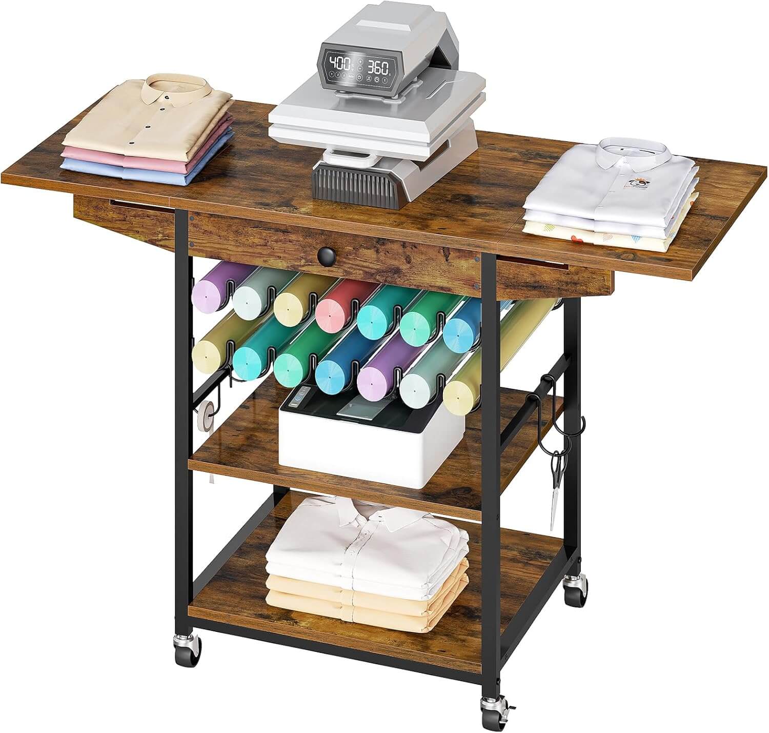 Wooden rolling cart with clothing, ironing board, and fabric rolls on a white background