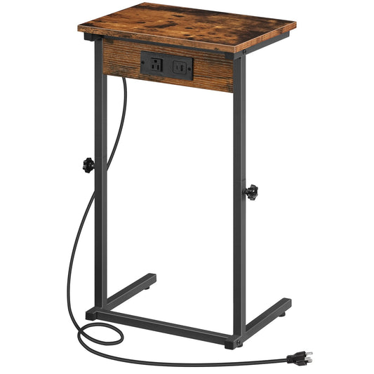 Isolated front view of an empty height adjustable C table with a built-in power strip and black cord.