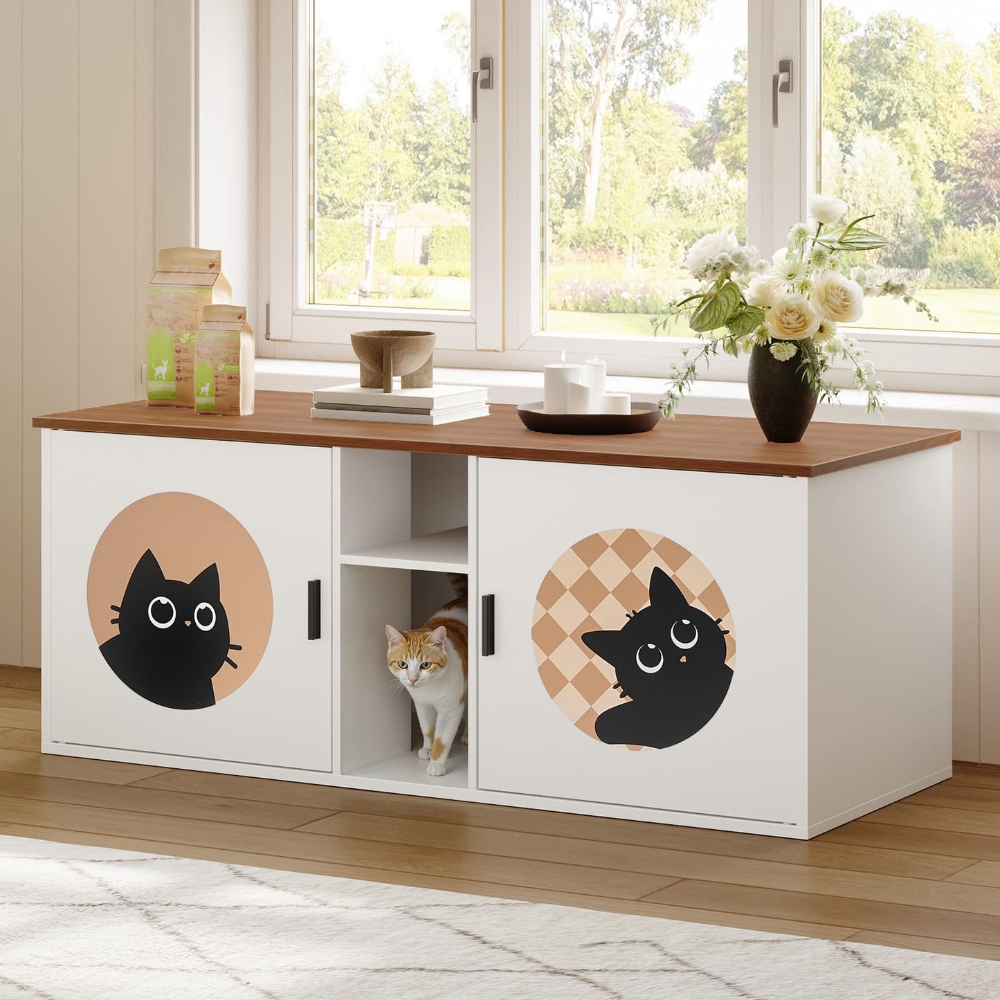 HOOBRO white enclosed cat litter box furniture bench with a calico cat peeking out next to a living room window.