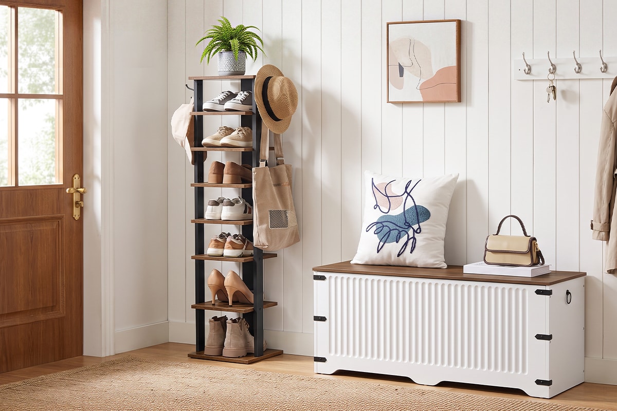Entryway with farmhouse storage bench and vertical shoe rack