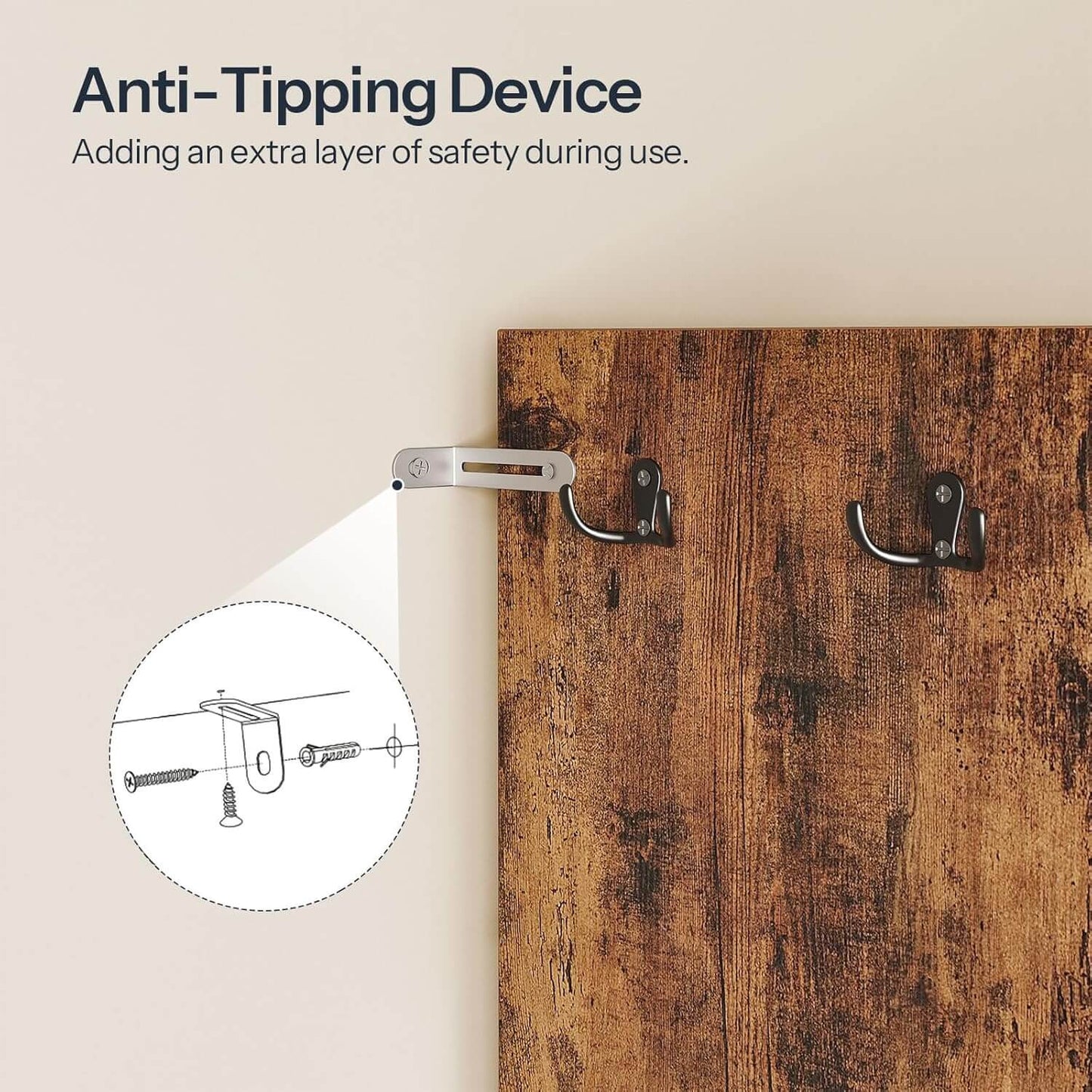 Anti-tipping device attached to a wooden surface with text explaining its safety feature.