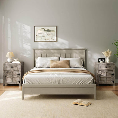 Neatly made bed with wooden headboard in a bedroom setting.