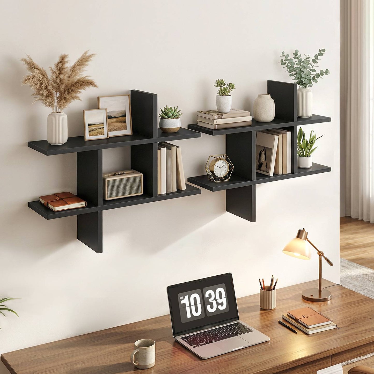 Two black geometric bookshelves joined side-by-side horizontally above a wooden home office writing desk.