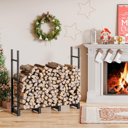 Heavy duty metal firewood rack filled with logs placed next to an indoor fireplace with Christmas decor.