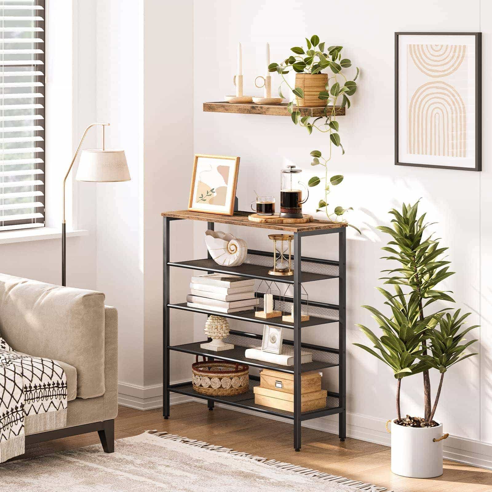 Living room with a bookshelf, plants, and a sofa