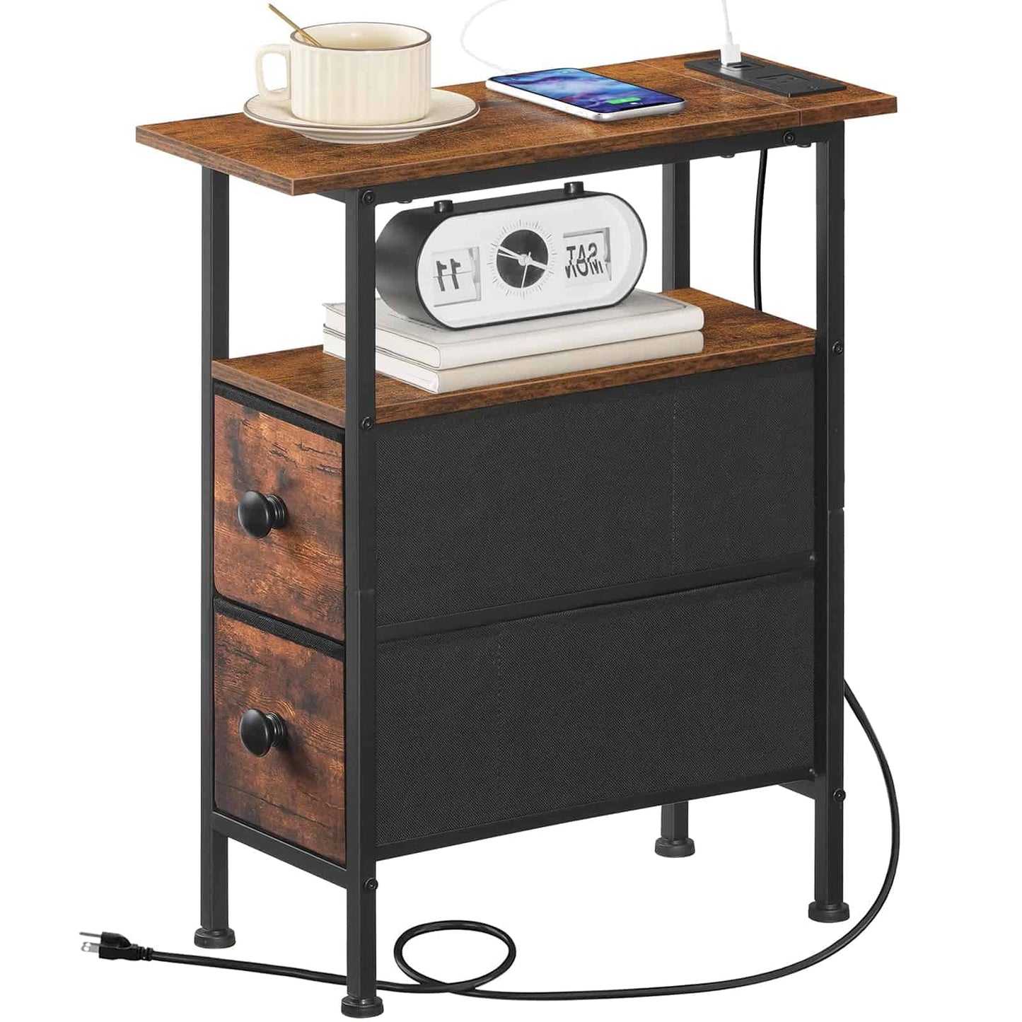 Three-quarter front view of an ultra-slim industrial side table featuring a rustic brown wood top, a middle shelf with an alarm clock, and 2 black fabric drawers.