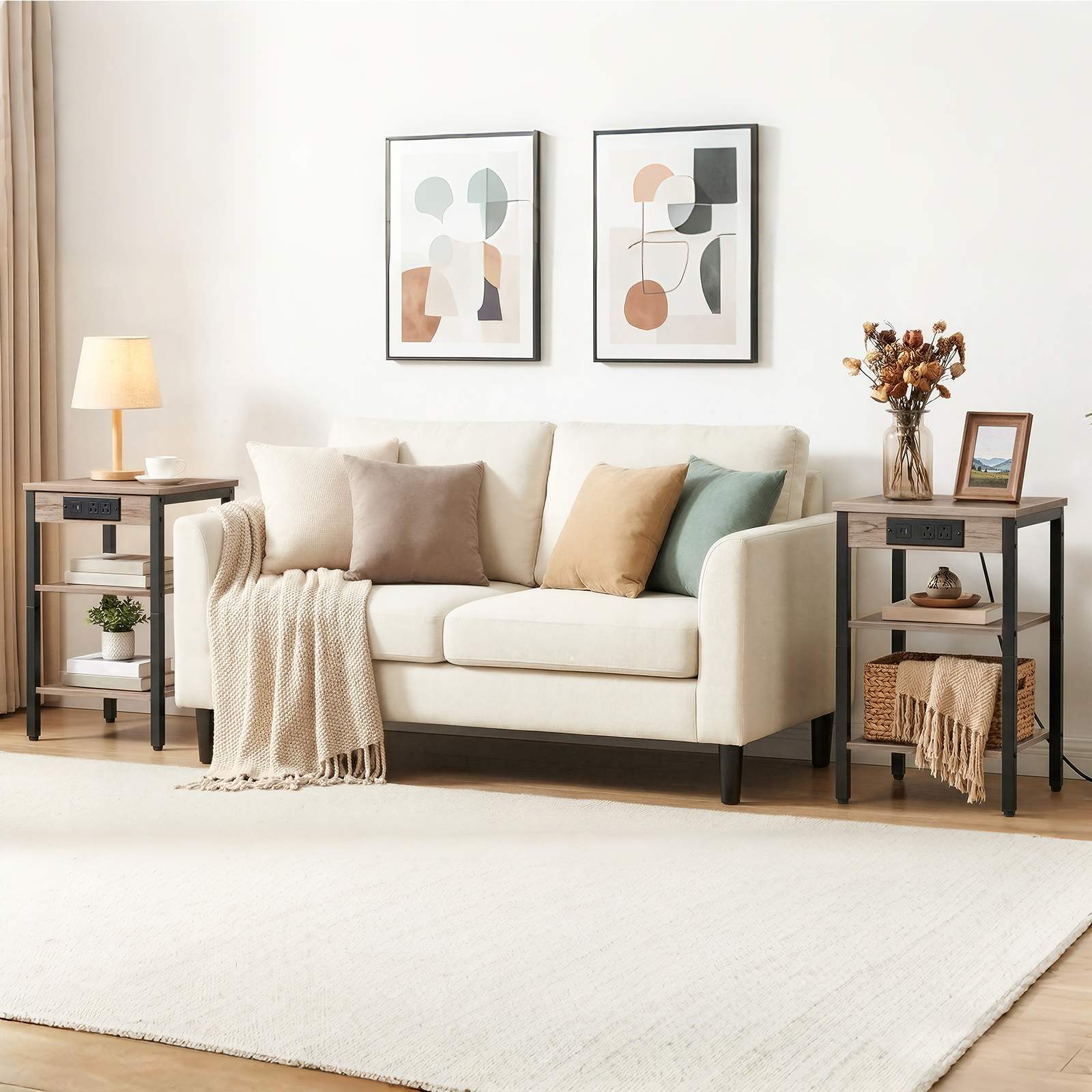 Cozy modern living room layout showcasing two industrial side tables styled on both sides of a sofa.