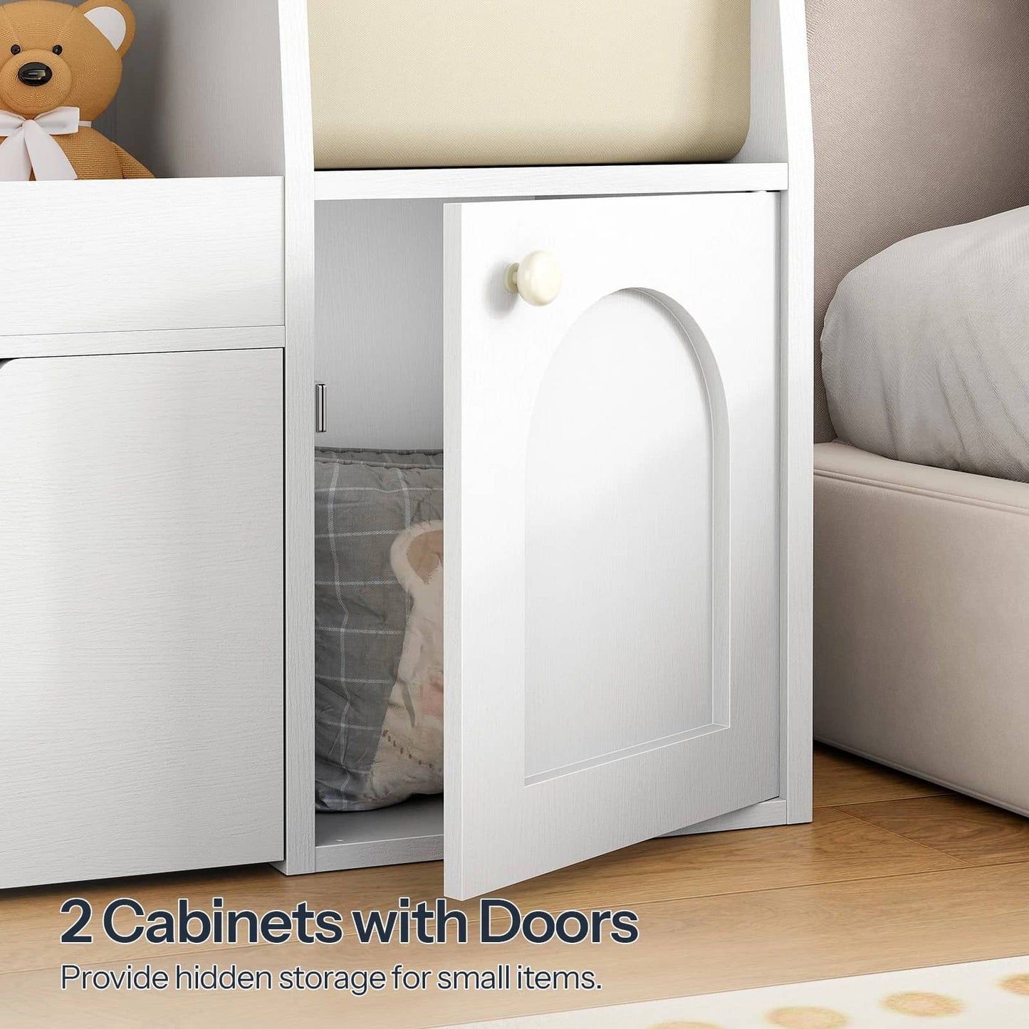 Close-up of the side storage cabinet with an open arched door revealing internal storage space.