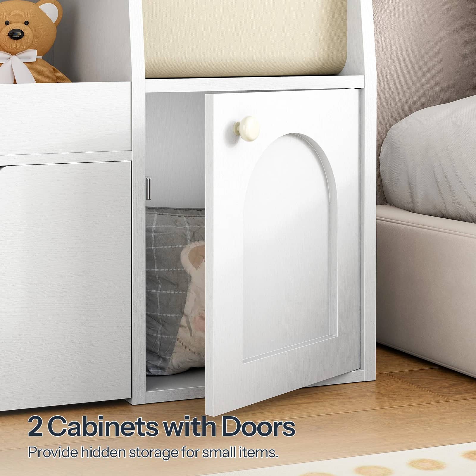 Close-up of the side storage cabinet with an open arched door revealing internal storage space.