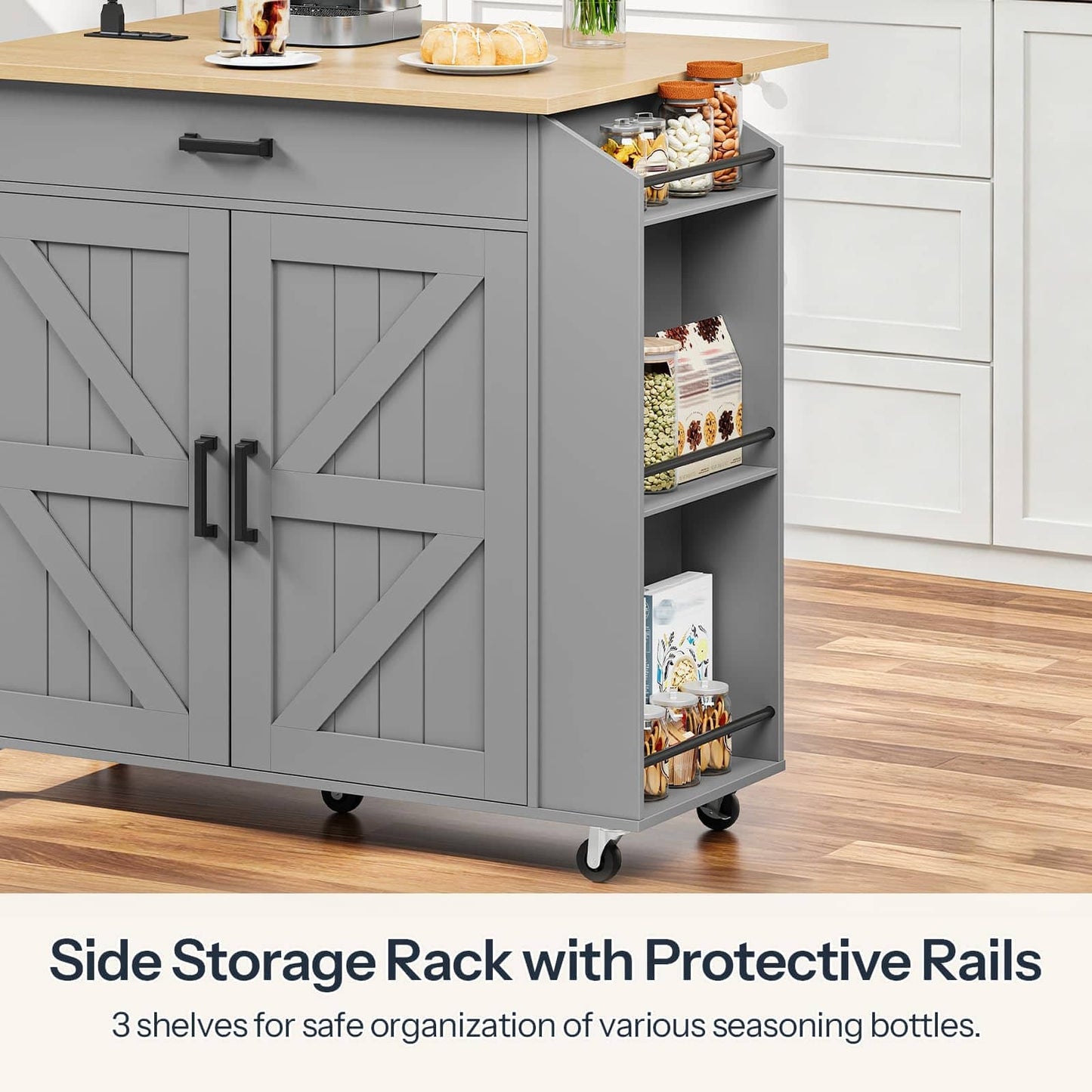 A gray kitchen island cart with a wood-look top, two barn-style cabinet doors, and a side storage rack with three shelves and protective rails, shown in a kitchen setting with text overlay at the bottom.