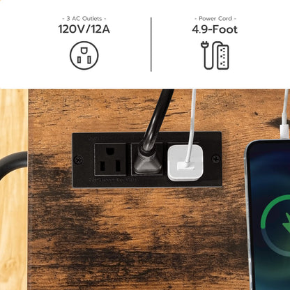 Close up of the embedded tabletop charging station showing 120V/12A AC outlets, USB ports, and a 4.9ft power cord.