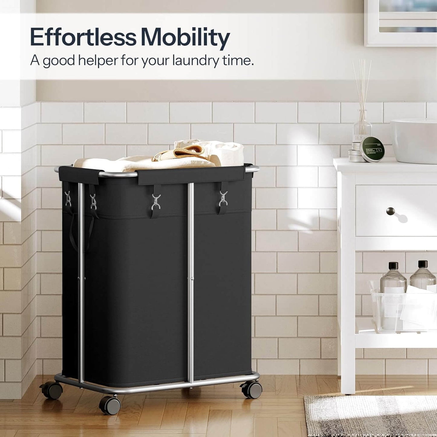 Black laundry cart with wheels in a bathroom setting, featuring text 'Effortless Mobility'.