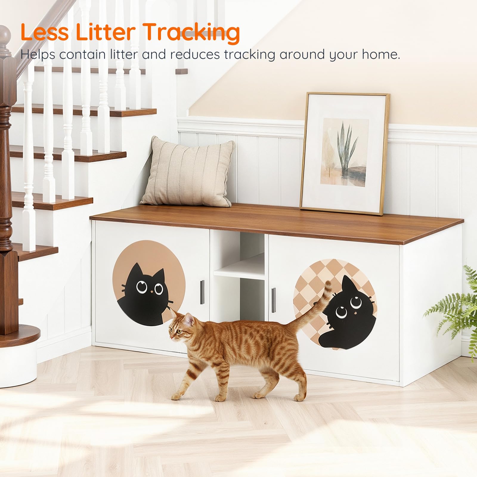 A tabby cat walking out of the center entrance of the white litter box bench fitted under a staircase corner.