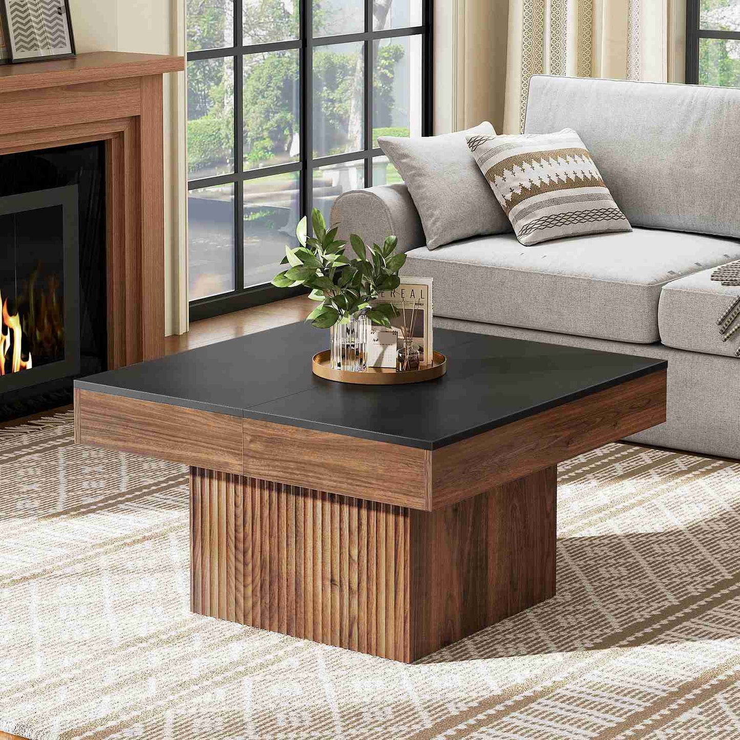 Luxury walnut wood coffee table placed onto a vintage rug near a living room fireplace and modern armchair.