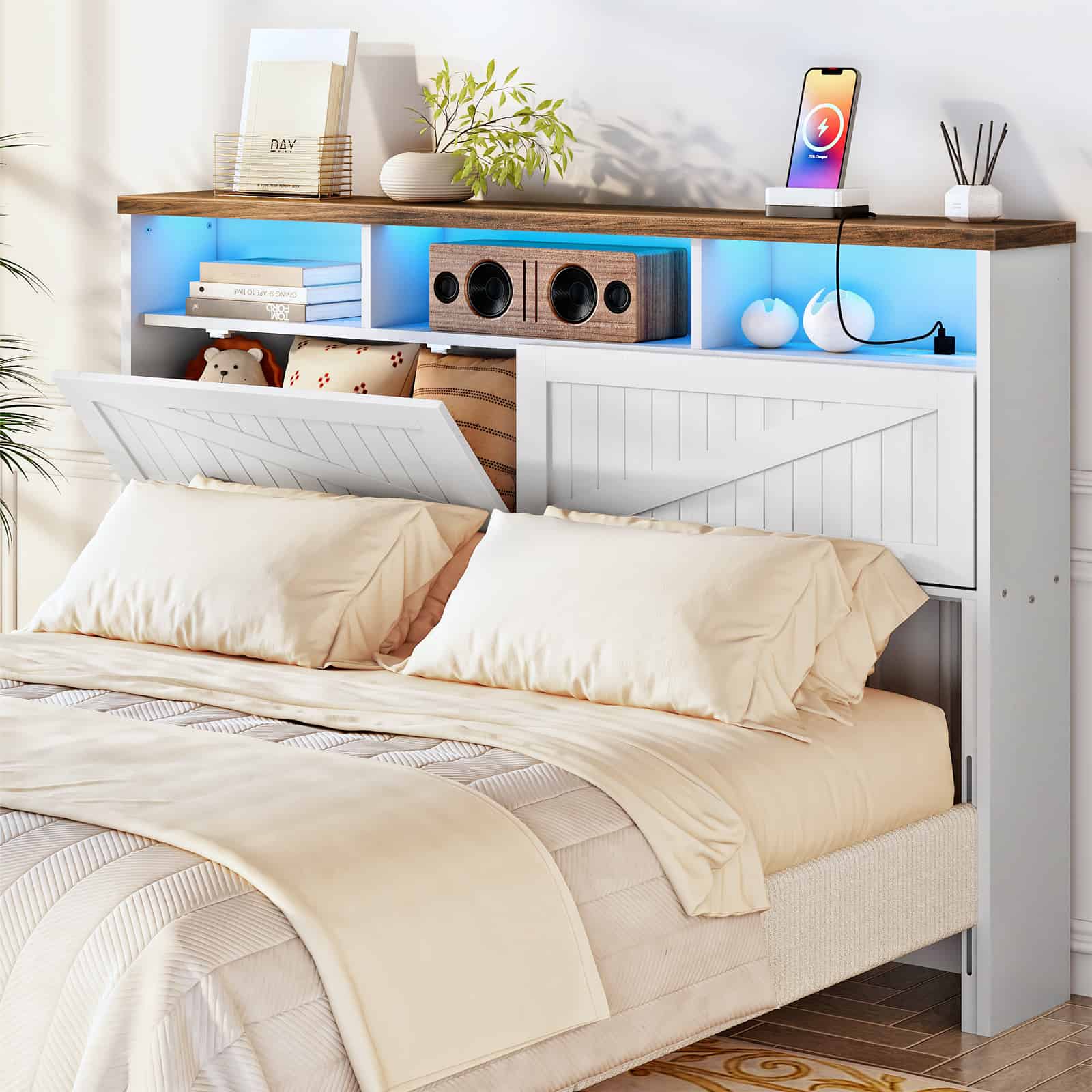 White farmhouse storage headboard with an open drop-down hidden compartment and vibrant blue LED lighting in a cozy bedroom.