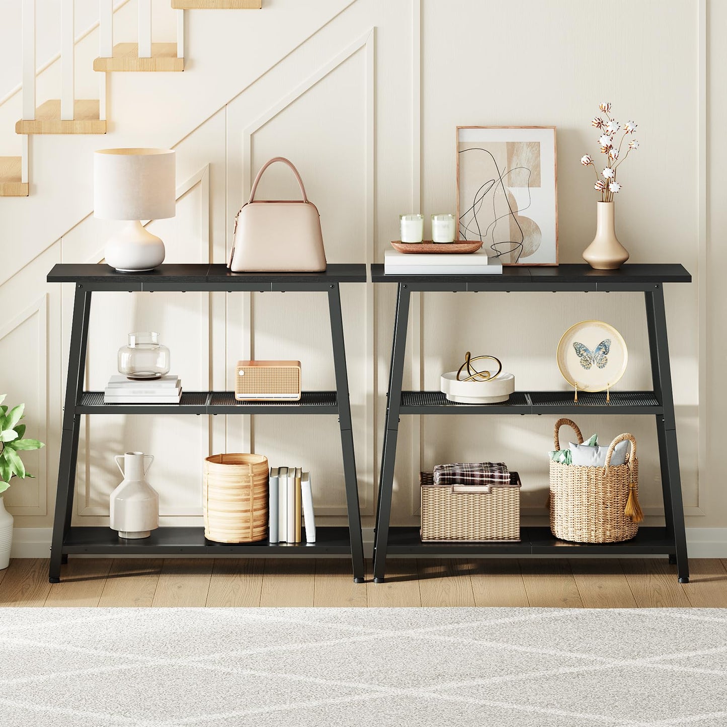 Two pieces of HOOBRO modular black entryway tables arranged side by side against a minimalist white foyer wall.