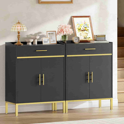 Two modern black shoe cabinets with gold handles placed side by side to create extra large entryway storage space.