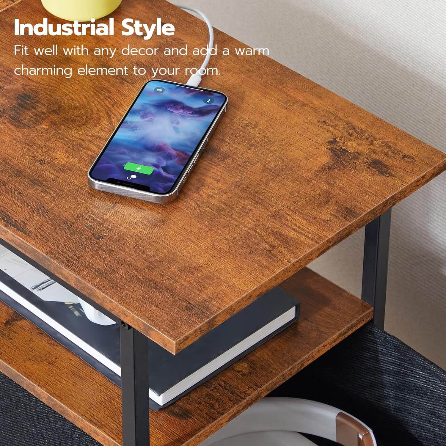 Smartphone on a wooden desk with text about industrial style.