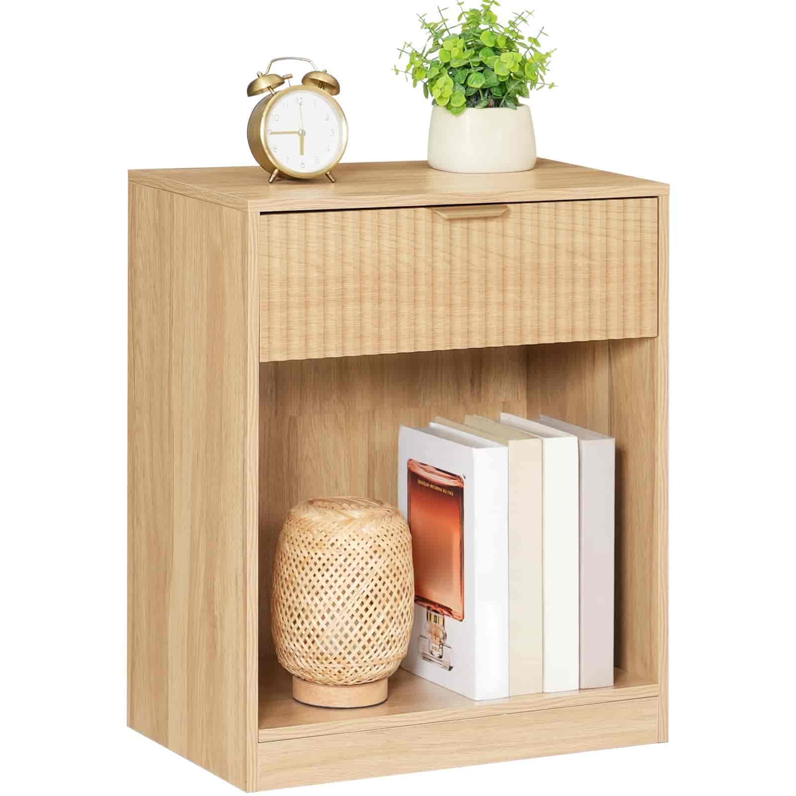 Wooden side table with a lamp, books, and plant on a white background
