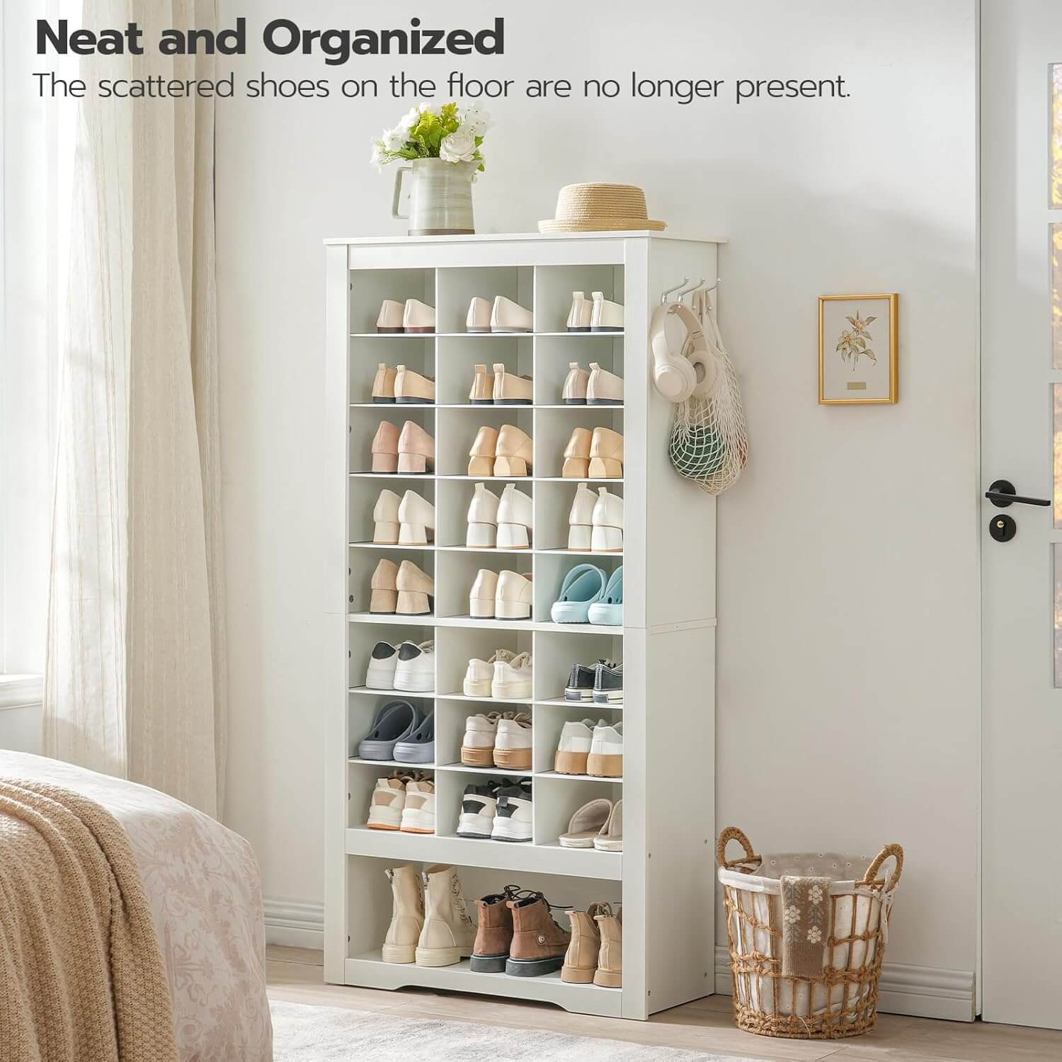 Neat and organized white shoe bookcase cabinet blending beautifully into a bedroom corner wall.