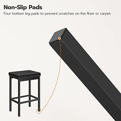 Close-up of non-slip rubber pads on metal stool legs to prevent scratches on wooden floors.