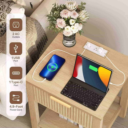 Wooden side table with electronic devices and power outlets on a neutral background