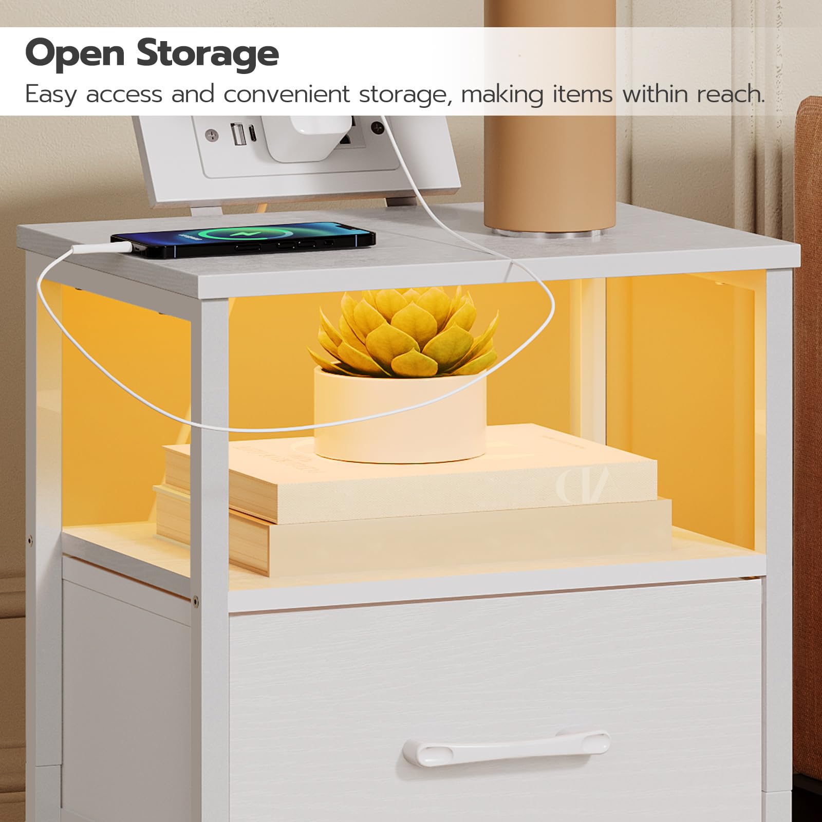 White storage unit with open shelves displaying books and a plant, with text 'Open Storage' above.