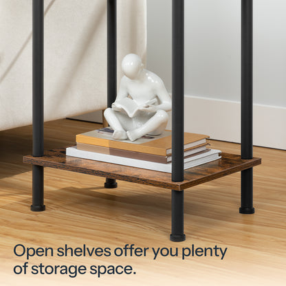 Close up of the open storage shelf layout holding books and a white human art sculpture under a black metal frame.