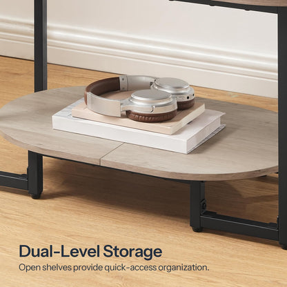 Close-up view of the lower shelf highlighting the dual-level open storage for books and decorative plates.