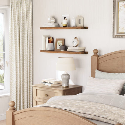 Over-the-toilet bathroom floating shelves organizing towels and toiletries elegantly.