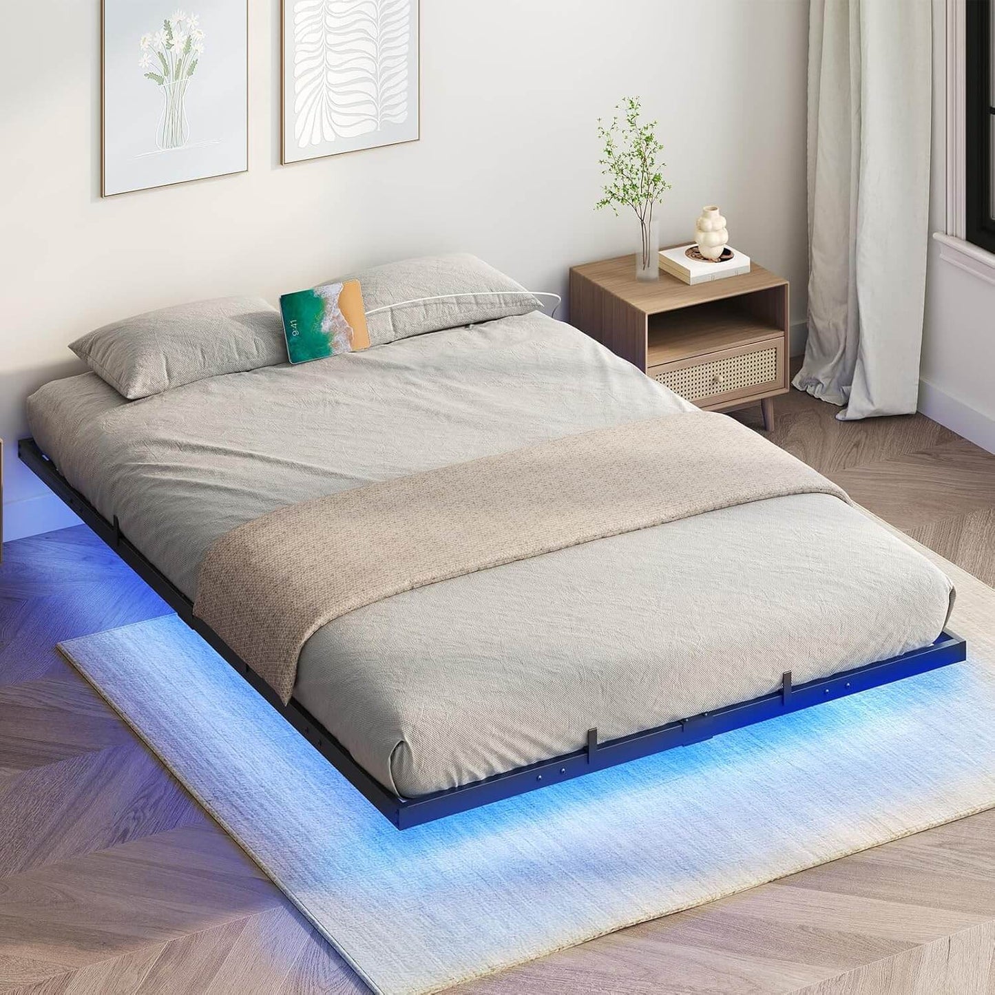 Modern bedroom with a platform bed featuring LED lighting.