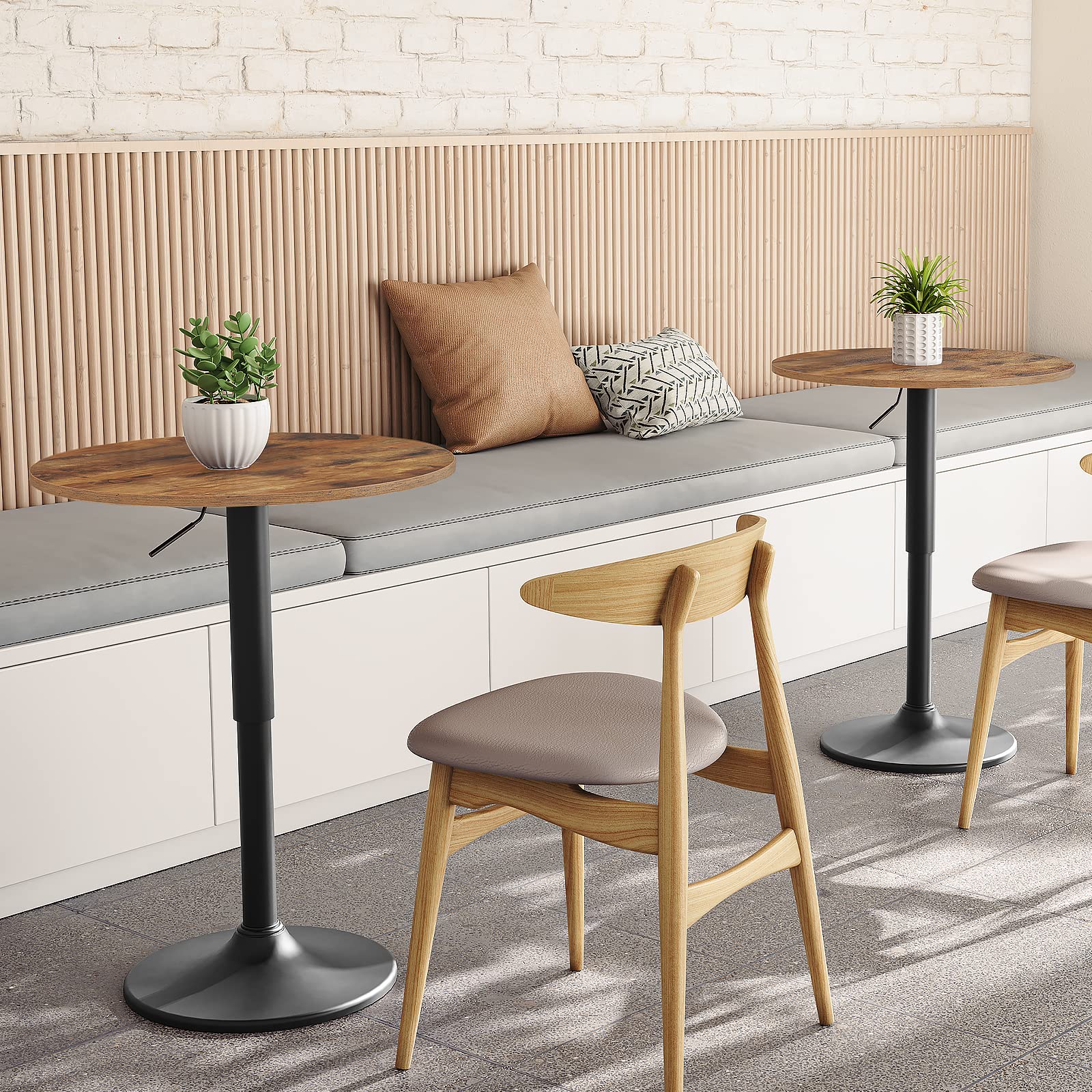 HOOBRO round bistro bar table paired with two industrial wood bar stools in a farmhouse kitchen corner.