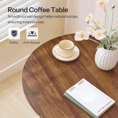 Close-up of the smooth wood-grain round tabletop showing waterproof and scratch-resistant icons.